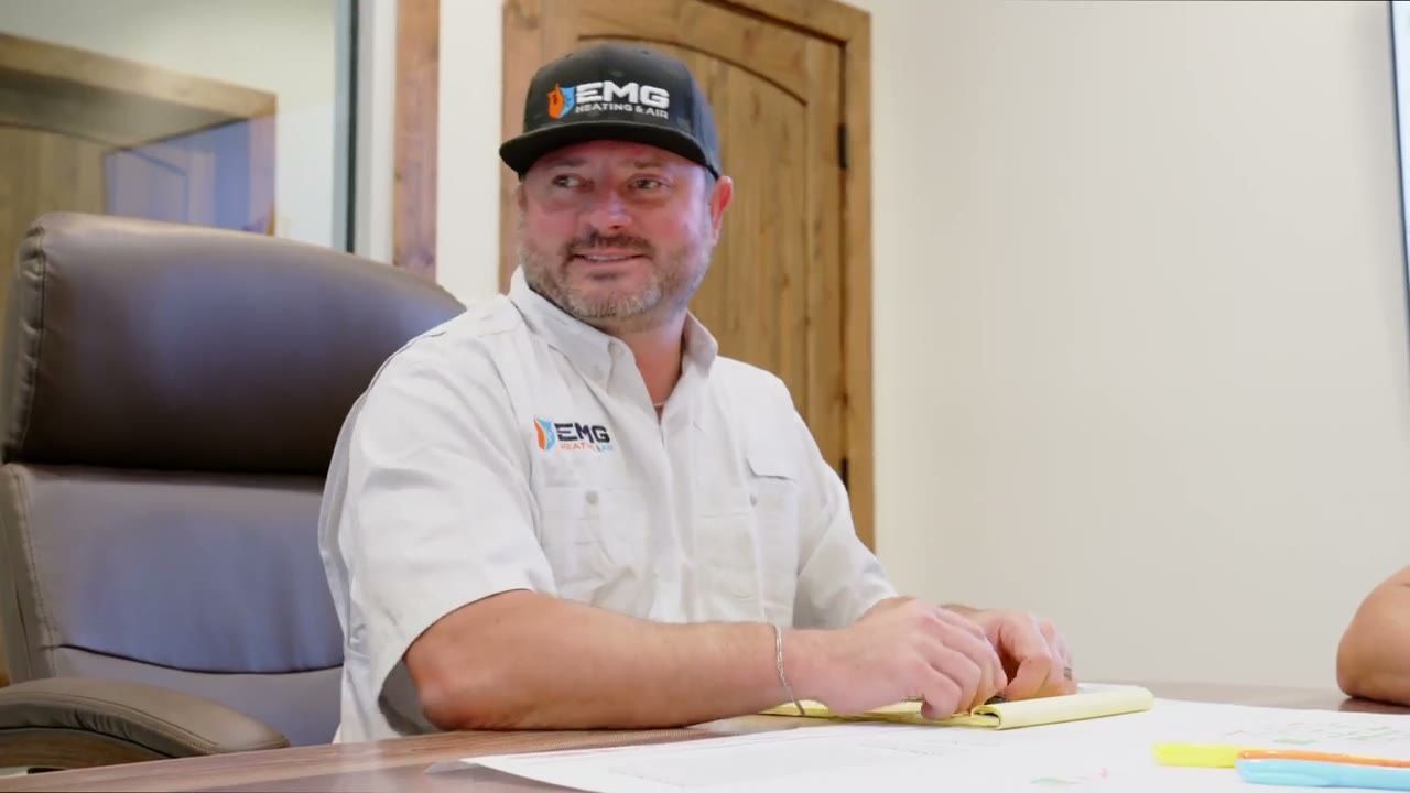 EMG Heating & Air owner at his desk